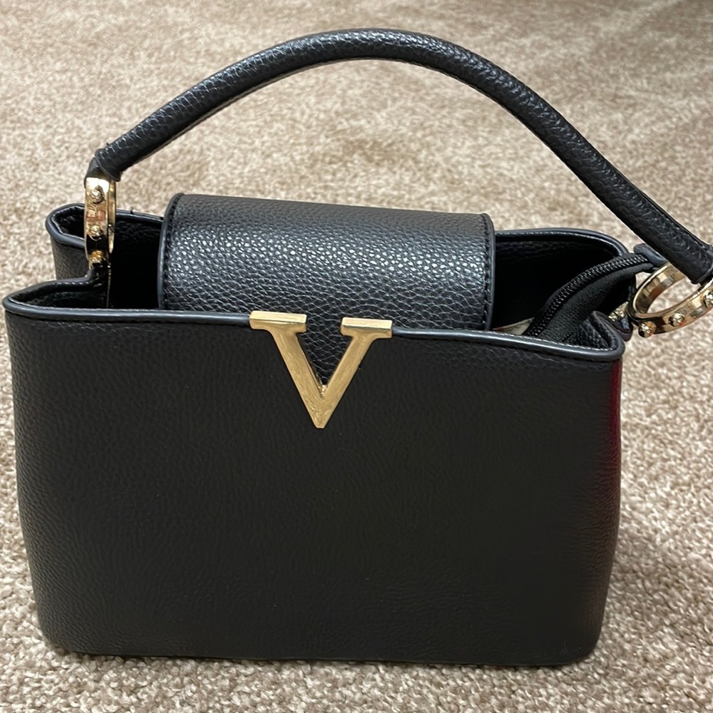 Black Hand Held Bag 😎